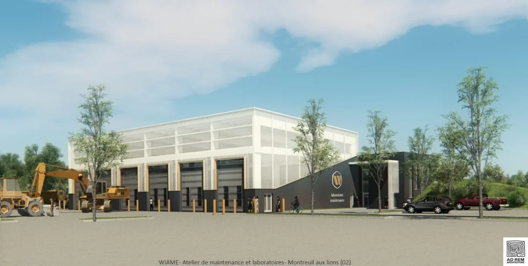 Bâtiment moderne avec véhicules et arbres.